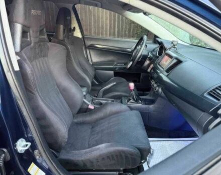 Синий Мицубиси Лансер Эволюшн, объемом двигателя 2 л и пробегом 144 тыс. км за 11000 $, фото 9 на Automoto.ua