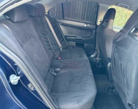 Синий Мицубиси Лансер Эволюшн, объемом двигателя 2 л и пробегом 144 тыс. км за 11000 $, фото 12 на Automoto.ua