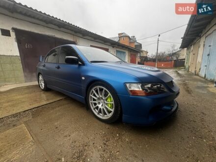 Синій Міцубісі Лансер Еволюшн, об'ємом двигуна 2 л та пробігом 177 тис. км за 100000 $, фото 1 на Automoto.ua