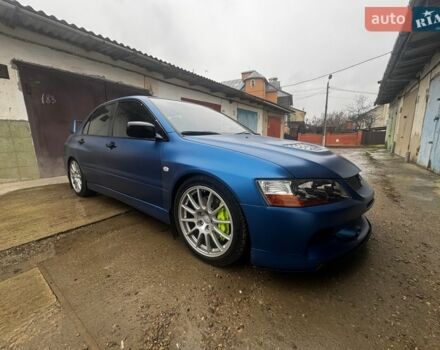 Синій Міцубісі Лансер Еволюшн, об'ємом двигуна 2 л та пробігом 177 тис. км за 100000 $, фото 1 на Automoto.ua
