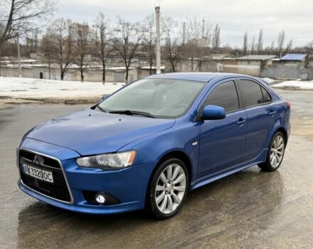 Синій Міцубісі Лансер Еволюшн, об'ємом двигуна 2 л та пробігом 212 тис. км за 8999 $, фото 1 на Automoto.ua