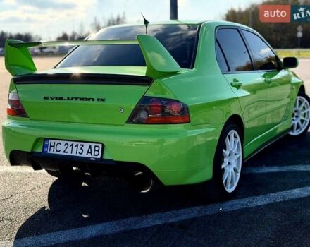 Зеленый Мицубиси Лансер Эволюшн, объемом двигателя 2 л и пробегом 135 тыс. км за 38500 $, фото 1 на Automoto.ua