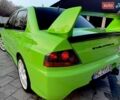 Зеленый Мицубиси Лансер Эволюшн, объемом двигателя 2 л и пробегом 135 тыс. км за 38500 $, фото 18 на Automoto.ua