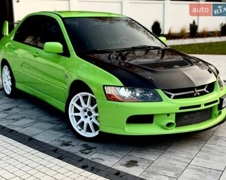 Зеленый Мицубиси Лансер Эволюшн, объемом двигателя 2 л и пробегом 135 тыс. км за 38500 $, фото 16 на Automoto.ua