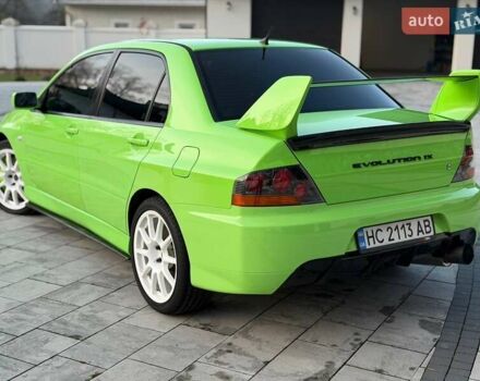 Зеленый Мицубиси Лансер Эволюшн, объемом двигателя 2 л и пробегом 135 тыс. км за 38500 $, фото 15 на Automoto.ua