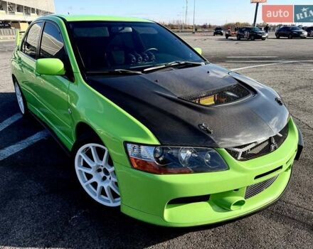 Зеленый Мицубиси Лансер Эволюшн, объемом двигателя 2 л и пробегом 135 тыс. км за 38500 $, фото 9 на Automoto.ua