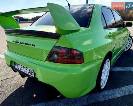 Зеленый Мицубиси Лансер Эволюшн, объемом двигателя 2 л и пробегом 135 тыс. км за 38500 $, фото 2 на Automoto.ua