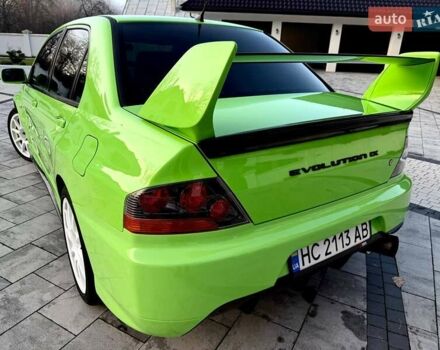 Зеленый Мицубиси Лансер Эволюшн, объемом двигателя 2 л и пробегом 135 тыс. км за 38500 $, фото 14 на Automoto.ua