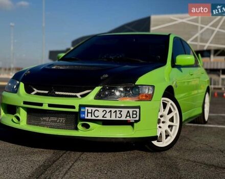 Зеленый Мицубиси Лансер Эволюшн, объемом двигателя 2 л и пробегом 135 тыс. км за 38500 $, фото 3 на Automoto.ua