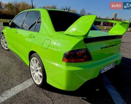 Зеленый Мицубиси Лансер Эволюшн, объемом двигателя 2 л и пробегом 135 тыс. км за 38500 $, фото 7 на Automoto.ua