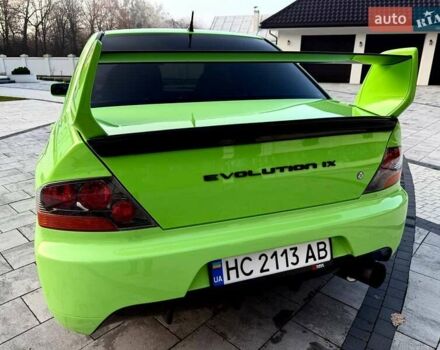 Зеленый Мицубиси Лансер Эволюшн, объемом двигателя 2 л и пробегом 135 тыс. км за 38500 $, фото 10 на Automoto.ua
