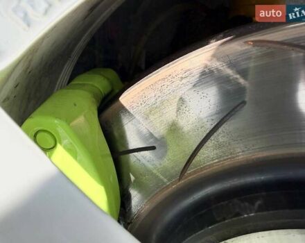 Зеленый Мицубиси Лансер Эволюшн, объемом двигателя 2 л и пробегом 135 тыс. км за 38500 $, фото 4 на Automoto.ua