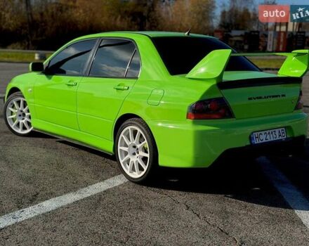 Зеленый Мицубиси Лансер Эволюшн, объемом двигателя 2 л и пробегом 135 тыс. км за 38500 $, фото 8 на Automoto.ua