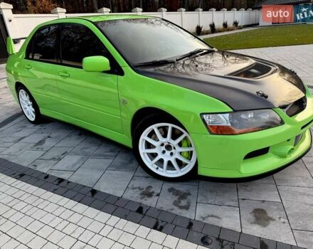 Зеленый Мицубиси Лансер Эволюшн, объемом двигателя 2 л и пробегом 135 тыс. км за 38500 $, фото 12 на Automoto.ua