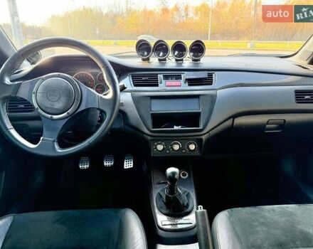 Зеленый Мицубиси Лансер Эволюшн, объемом двигателя 2 л и пробегом 135 тыс. км за 38500 $, фото 21 на Automoto.ua