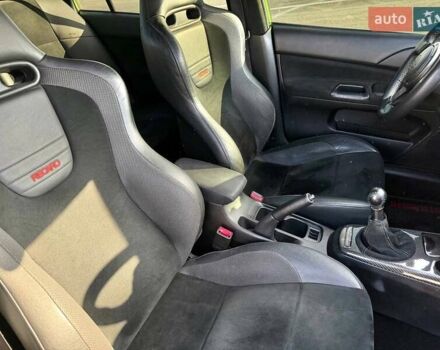 Зеленый Мицубиси Лансер Эволюшн, объемом двигателя 2 л и пробегом 135 тыс. км за 38500 $, фото 23 на Automoto.ua