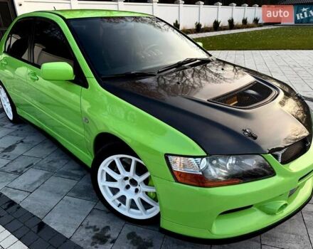 Зеленый Мицубиси Лансер Эволюшн, объемом двигателя 2 л и пробегом 135 тыс. км за 38500 $, фото 19 на Automoto.ua