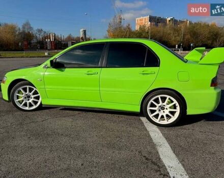 Зеленый Мицубиси Лансер Эволюшн, объемом двигателя 2 л и пробегом 135 тыс. км за 38500 $, фото 5 на Automoto.ua
