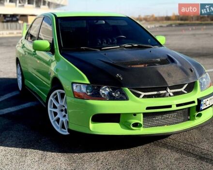 Зеленый Мицубиси Лансер Эволюшн, объемом двигателя 2 л и пробегом 135 тыс. км за 38500 $, фото 6 на Automoto.ua