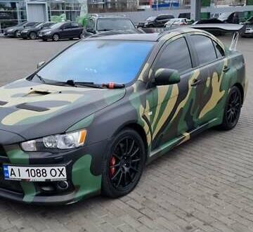Міцубісі Лансер Еволюшн 2008 у Києві на Automoto.ua Зелений Міцубісі Лансер Еволюшн, об'ємом двигуна 2 л та пробігом 97 тис. км за 21000 $, фото 1 на Automoto.ua