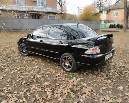 Черный Мицубиси Лансер Спортбэк, объемом двигателя 2 л и пробегом 219 тыс. км за 3999 $, фото 12 на Automoto.ua