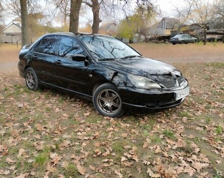 Черный Мицубиси Лансер Спортбэк, объемом двигателя 2 л и пробегом 219 тыс. км за 3999 $, фото 3 на Automoto.ua