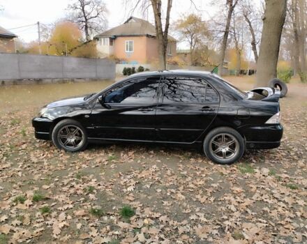 Черный Мицубиси Лансер Спортбэк, объемом двигателя 2 л и пробегом 219 тыс. км за 3999 $, фото 15 на Automoto.ua