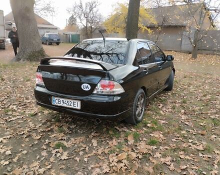 Черный Мицубиси Лансер Спортбэк, объемом двигателя 2 л и пробегом 219 тыс. км за 3999 $, фото 4 на Automoto.ua