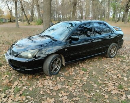 Черный Мицубиси Лансер Спортбэк, объемом двигателя 2 л и пробегом 219 тыс. км за 3999 $, фото 1 на Automoto.ua