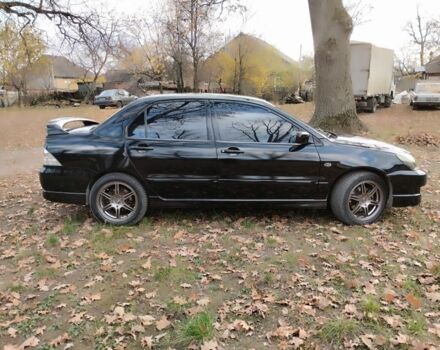 Черный Мицубиси Лансер Спортбэк, объемом двигателя 2 л и пробегом 219 тыс. км за 3999 $, фото 11 на Automoto.ua