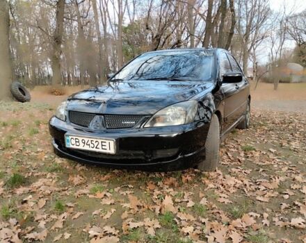 Черный Мицубиси Лансер Спортбэк, объемом двигателя 2 л и пробегом 219 тыс. км за 3999 $, фото 8 на Automoto.ua