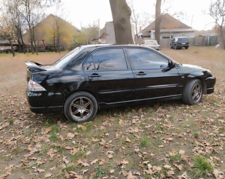 Черный Мицубиси Лансер Спортбэк, объемом двигателя 2 л и пробегом 219 тыс. км за 3999 $, фото 10 на Automoto.ua