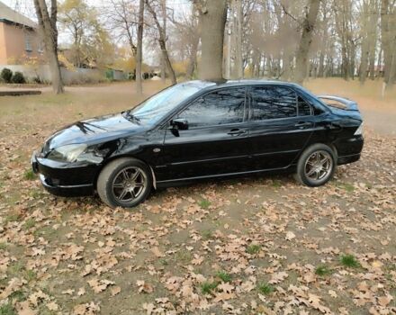 Черный Мицубиси Лансер Спортбэк, объемом двигателя 2 л и пробегом 219 тыс. км за 3999 $, фото 14 на Automoto.ua