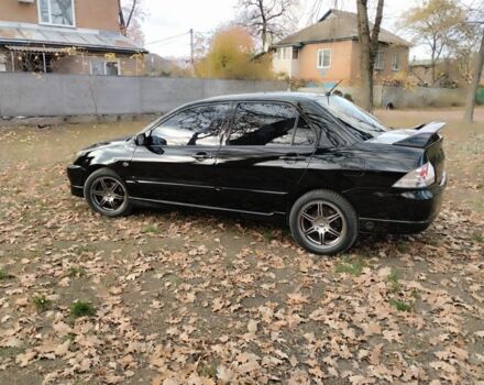 Черный Мицубиси Лансер Спортбэк, объемом двигателя 2 л и пробегом 219 тыс. км за 3999 $, фото 6 на Automoto.ua