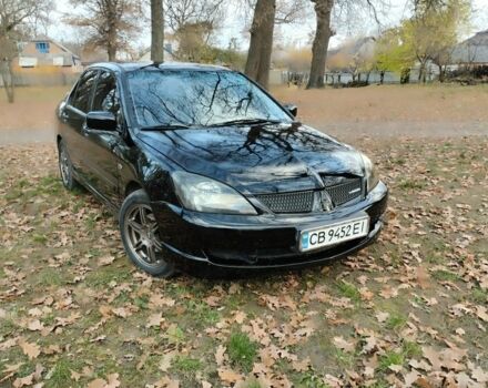 Черный Мицубиси Лансер Спортбэк, объемом двигателя 2 л и пробегом 219 тыс. км за 3999 $, фото 2 на Automoto.ua