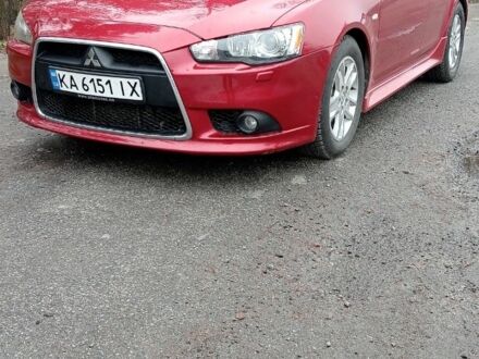 Красный Мицубиси Лансер Спортбэк, объемом двигателя 1.8 л и пробегом 318 тыс. км за 6850 $, фото 1 на Automoto.ua