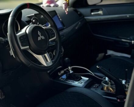 Синій Міцубісі Лансер Спортбек, об'ємом двигуна 2 л та пробігом 185 тис. км за 7499 $, фото 4 на Automoto.ua