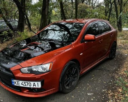 Оранжевый Мицубиси Лансер Спортбэк, объемом двигателя 2 л и пробегом 165 тыс. км за 8000 $, фото 2 на Automoto.ua