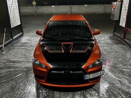 Оранжевый Мицубиси Лансер Спортбэк, объемом двигателя 2 л и пробегом 165 тыс. км за 8000 $, фото 1 на Automoto.ua