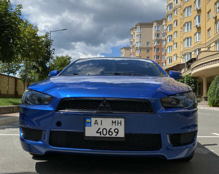 Синій Міцубісі Лансер Х, об'ємом двигуна 2 л та пробігом 140 тис. км за 9000 $, фото 45 на Automoto.ua