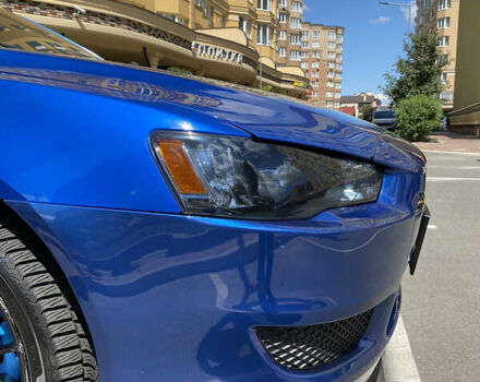 Синій Міцубісі Лансер Х, об'ємом двигуна 2 л та пробігом 140 тис. км за 9000 $, фото 78 на Automoto.ua
