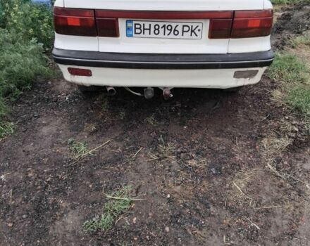 Белый Мицубиси Лансер, объемом двигателя 1.8 л и пробегом 86 тыс. км за 700 $, фото 4 на Automoto.ua