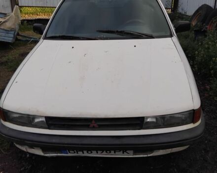 Белый Мицубиси Лансер, объемом двигателя 1.8 л и пробегом 86 тыс. км за 700 $, фото 1 на Automoto.ua