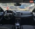 Мицубиси Лансер 2008 в Днепре (Днепропетровске) на Automoto.ua Белый Мицубиси Лансер, объемом двигателя 1.8 л и пробегом 185 тыс. км за 8500 $, фото 15 на Automoto.ua