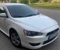Білий Міцубісі Lancer, об'ємом двигуна 1.8 л та пробігом 230 тис. км за 6500 $, фото 1 на Automoto.ua