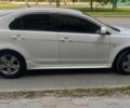 Білий Міцубісі Lancer, об'ємом двигуна 1.8 л та пробігом 230 тис. км за 6500 $, фото 2 на Automoto.ua