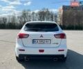 Белый Мицубиси Лансер, объемом двигателя 2 л и пробегом 154 тыс. км за 8900 $, фото 17 на Automoto.ua
