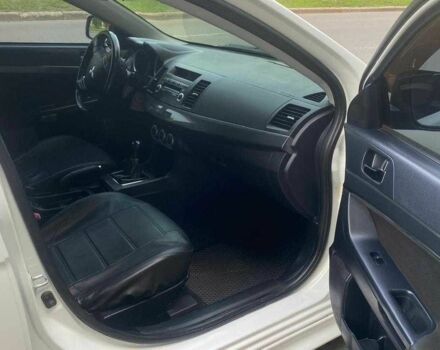 Білий Міцубісі Lancer, об'ємом двигуна 1.8 л та пробігом 230 тис. км за 6500 $, фото 7 на Automoto.ua