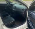 Білий Міцубісі Lancer, об'ємом двигуна 1.8 л та пробігом 230 тис. км за 6500 $, фото 7 на Automoto.ua