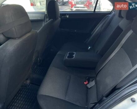 Мицубиси Лансер 2008 в Днепре (Днепропетровске) на Automoto.ua Белый Мицубиси Лансер, объемом двигателя 1.8 л и пробегом 185 тыс. км за 8500 $, фото 19 на Automoto.ua